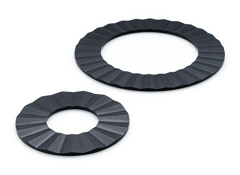 Continenta Untersetzer Ring 2.tlg. in Duracore Continenta Untersetzer Ring 2.tlg. in Duracore, ring, Dichtung, dunkel, texturiert, Unterlage