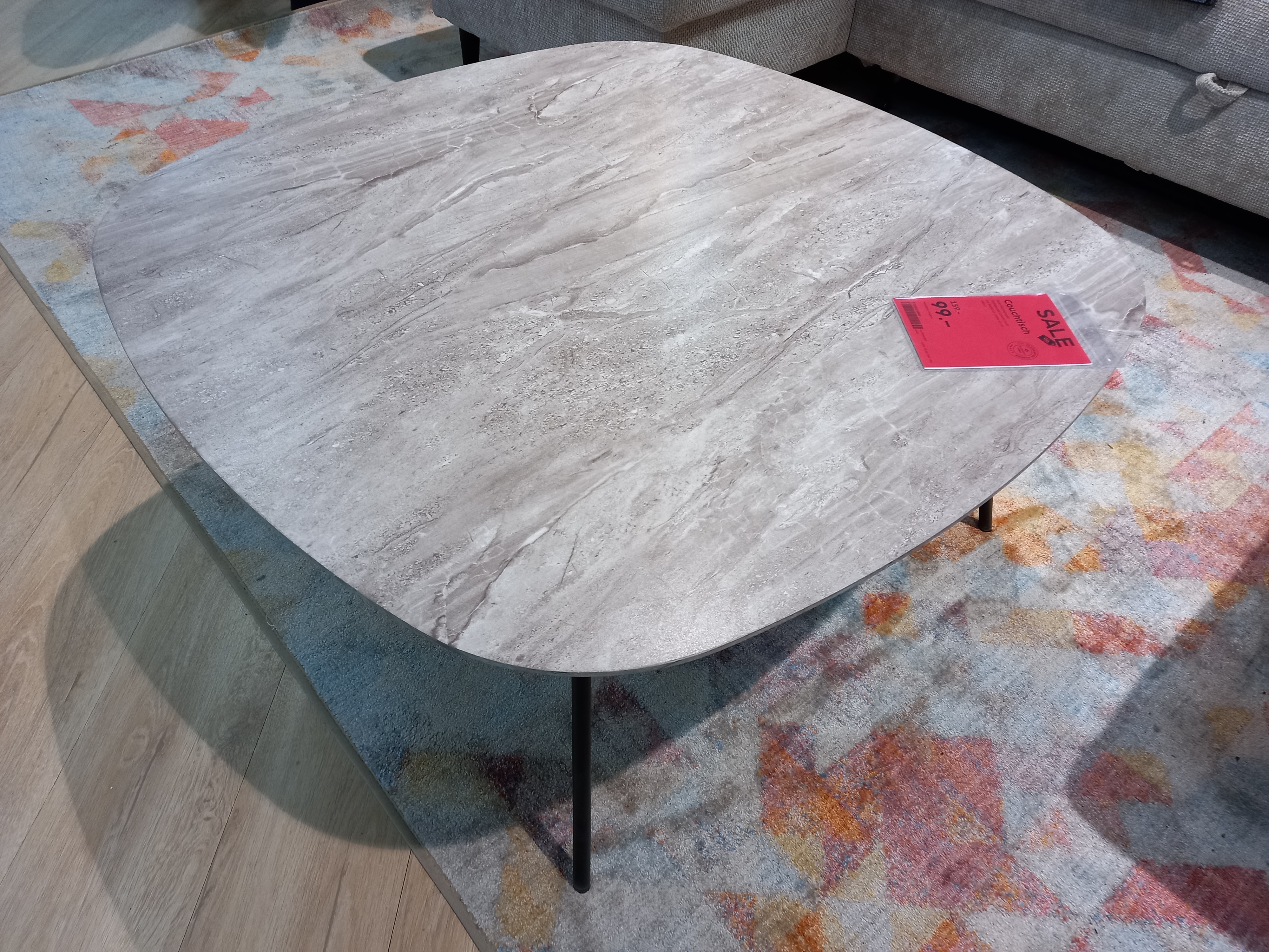 Couchtisch Caracas, Couchtisch, ovale Tischplatte, Steinoptik, grau-beige, schwarze Metallbeine